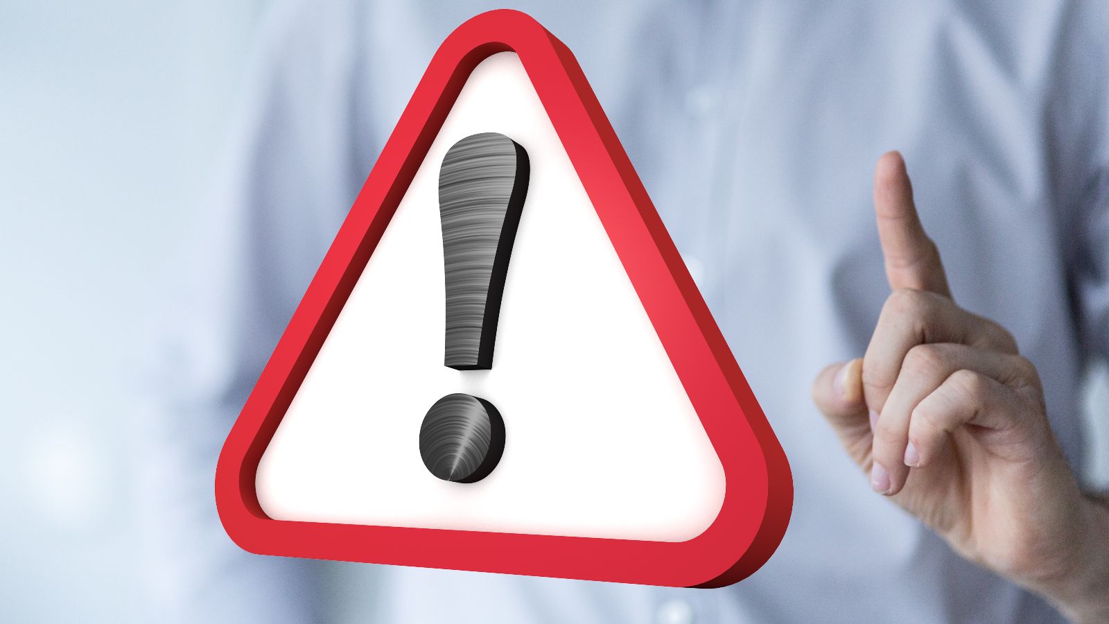 Das Bild zeigt ein Warnschild mit einem Ausrufezeichen neben einer Person die mahnend den Zeigefinger erhebt.