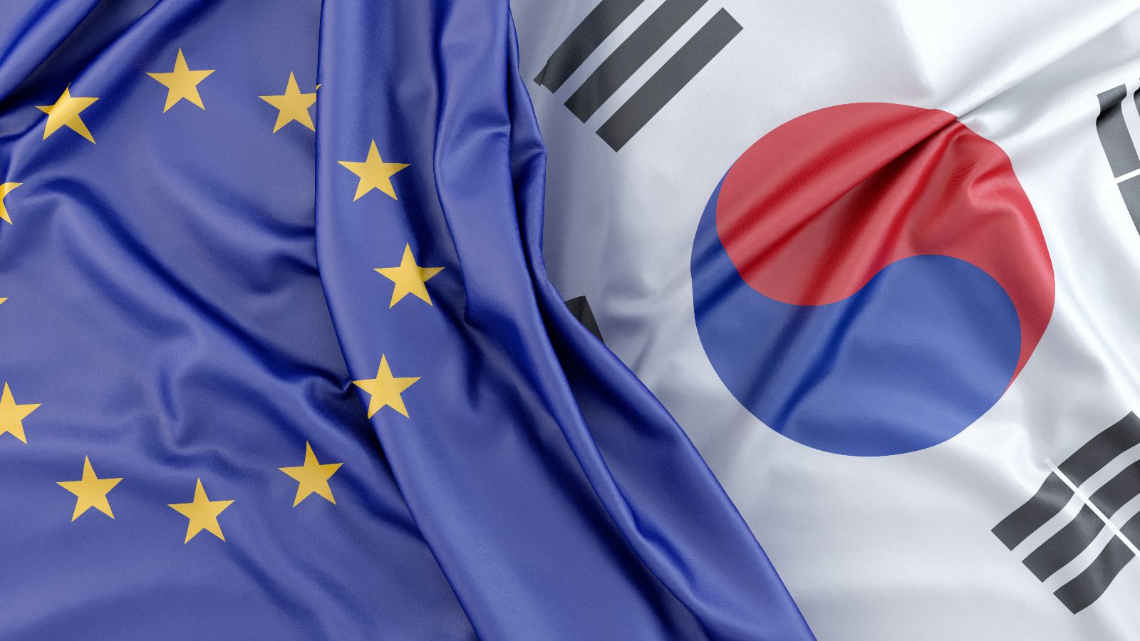 Das Bild zeigt die EU- und Koreoflagge