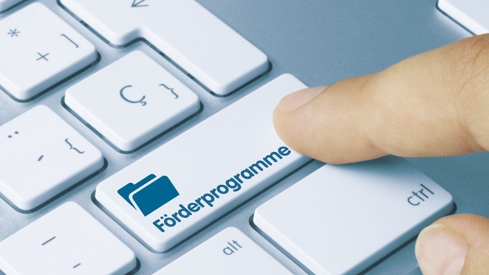 Computertaste mit der Aufschrift Förderprogramme